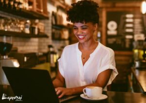 Business Loans in Botswana: Botswana entrepreneur analyzing market data on a laptop