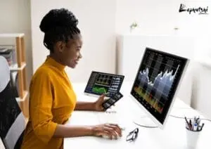Effective Marketing Strategies for Small Businesses in Botswana 1 Botswana entrepreneur analyzing market data on a laptop